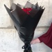 Букет из красных роз в стильном оформлении